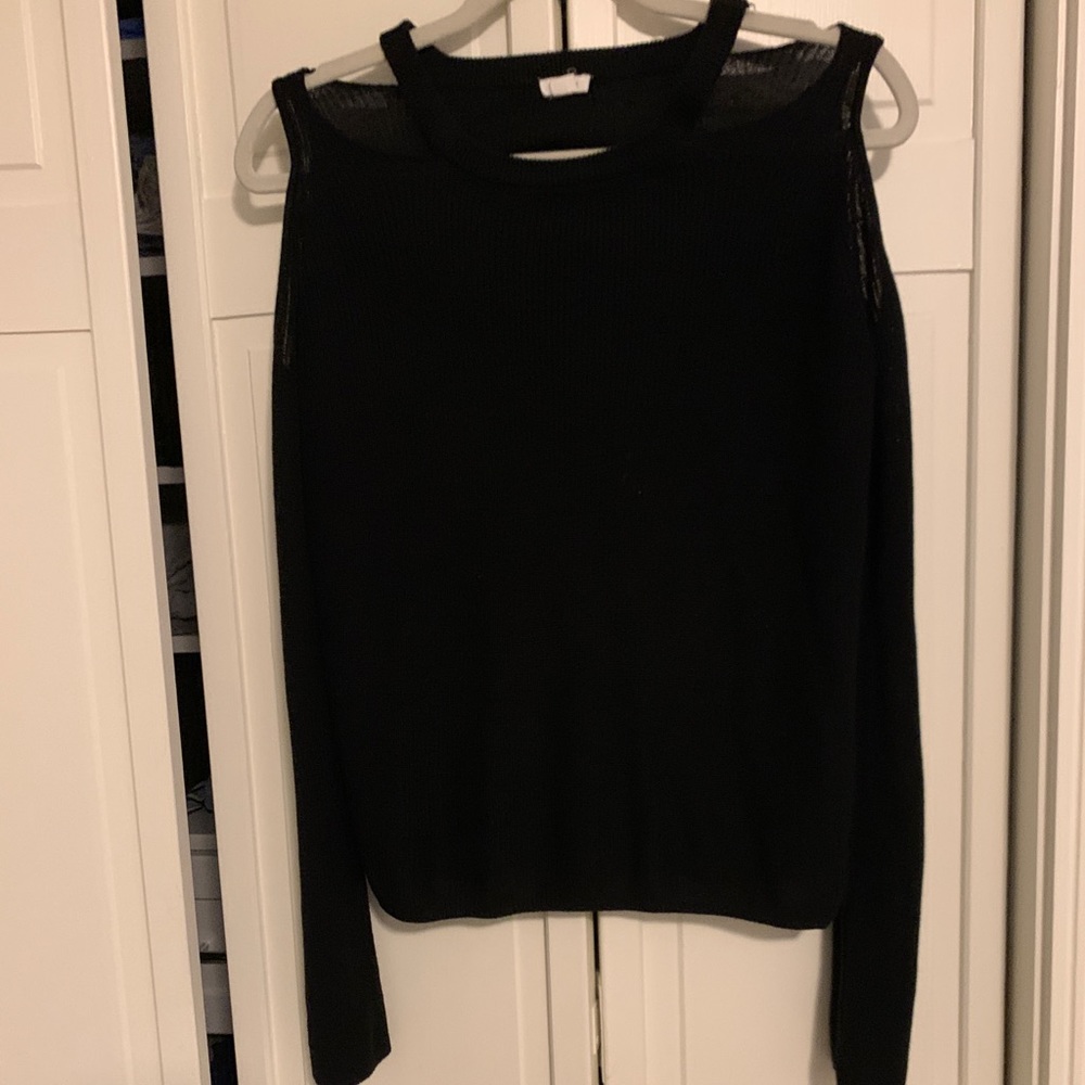Sweater with two shoulder cut outs